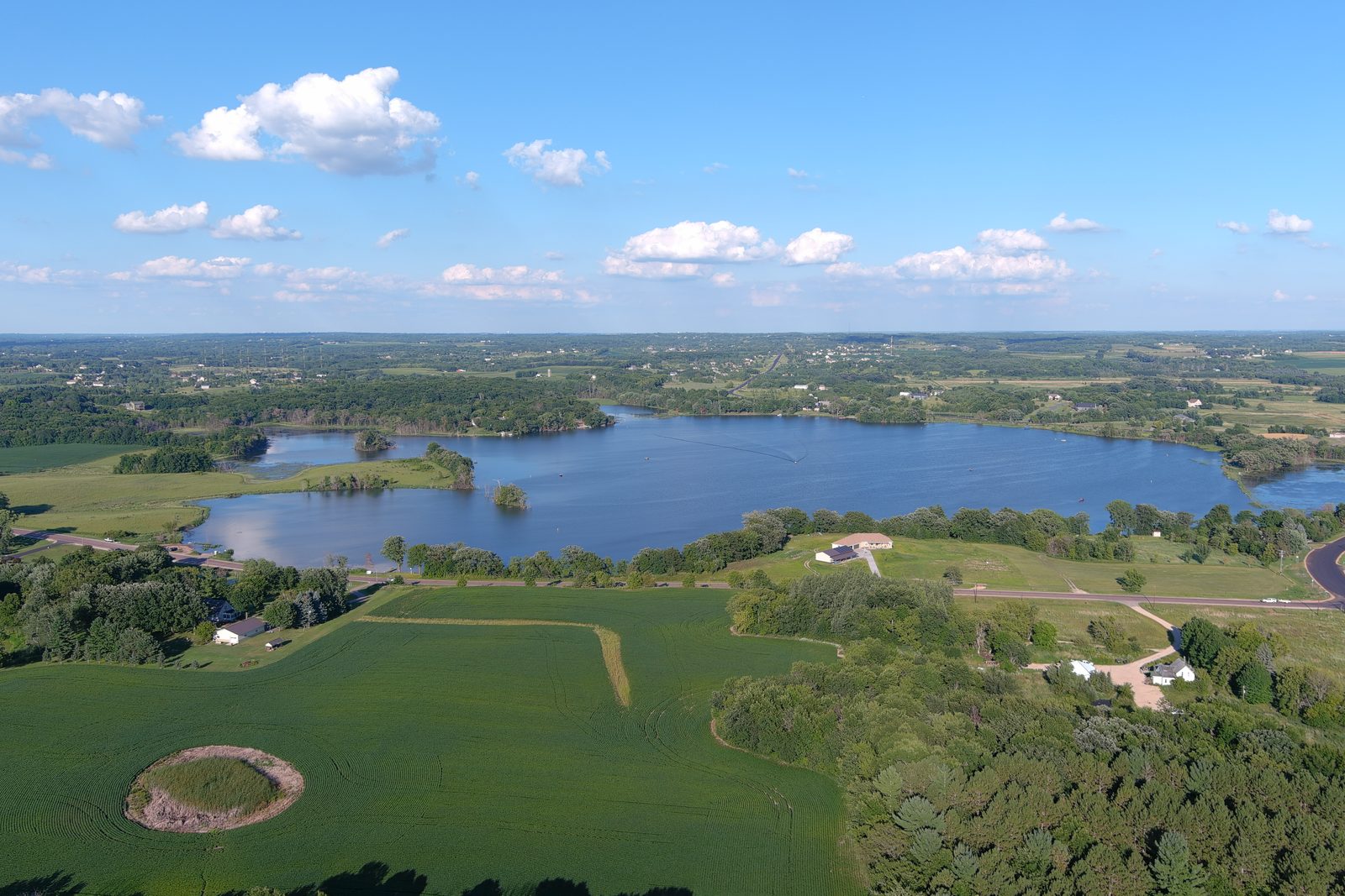 Daytime aerial photo of lakefront acreage in the Upper Cumberland by Harris Aerial